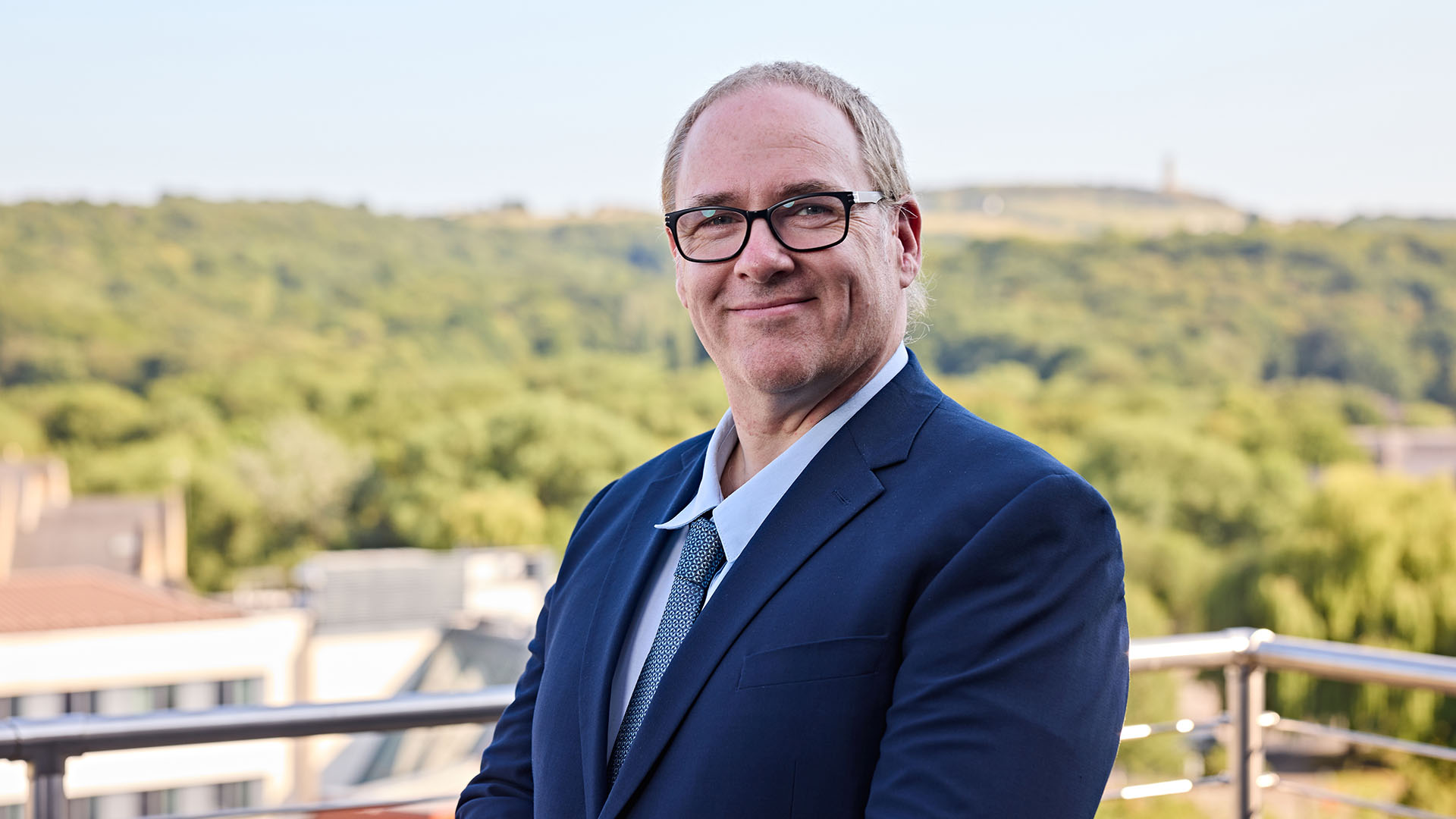 A headshot of Professor John Murray