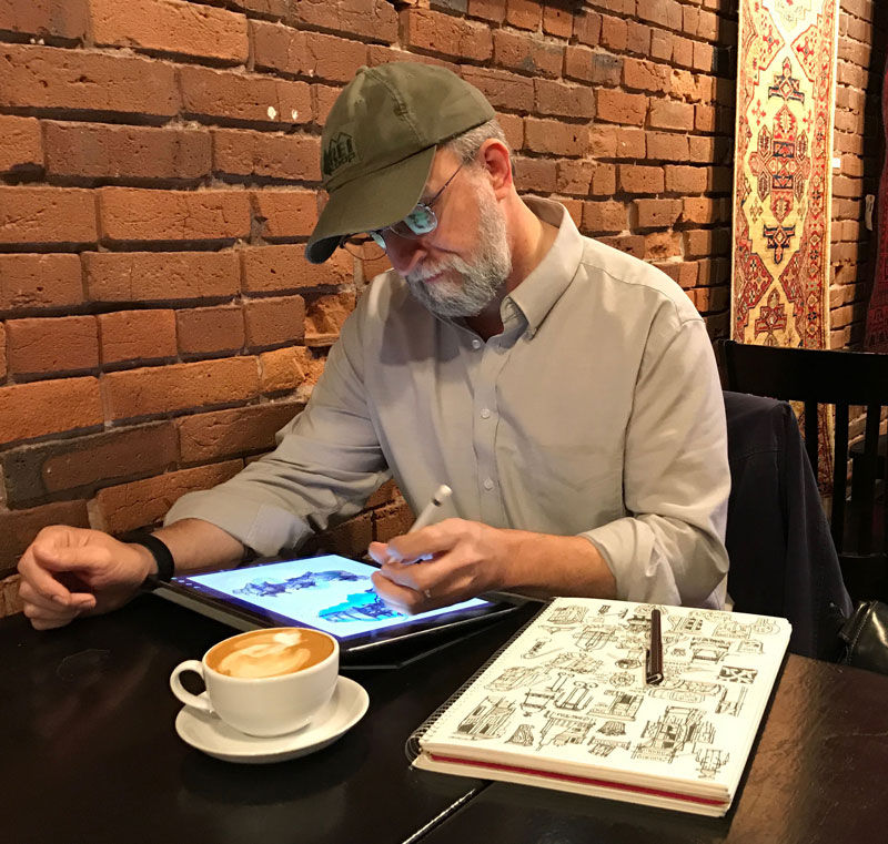 Don Carson working on his tablet 