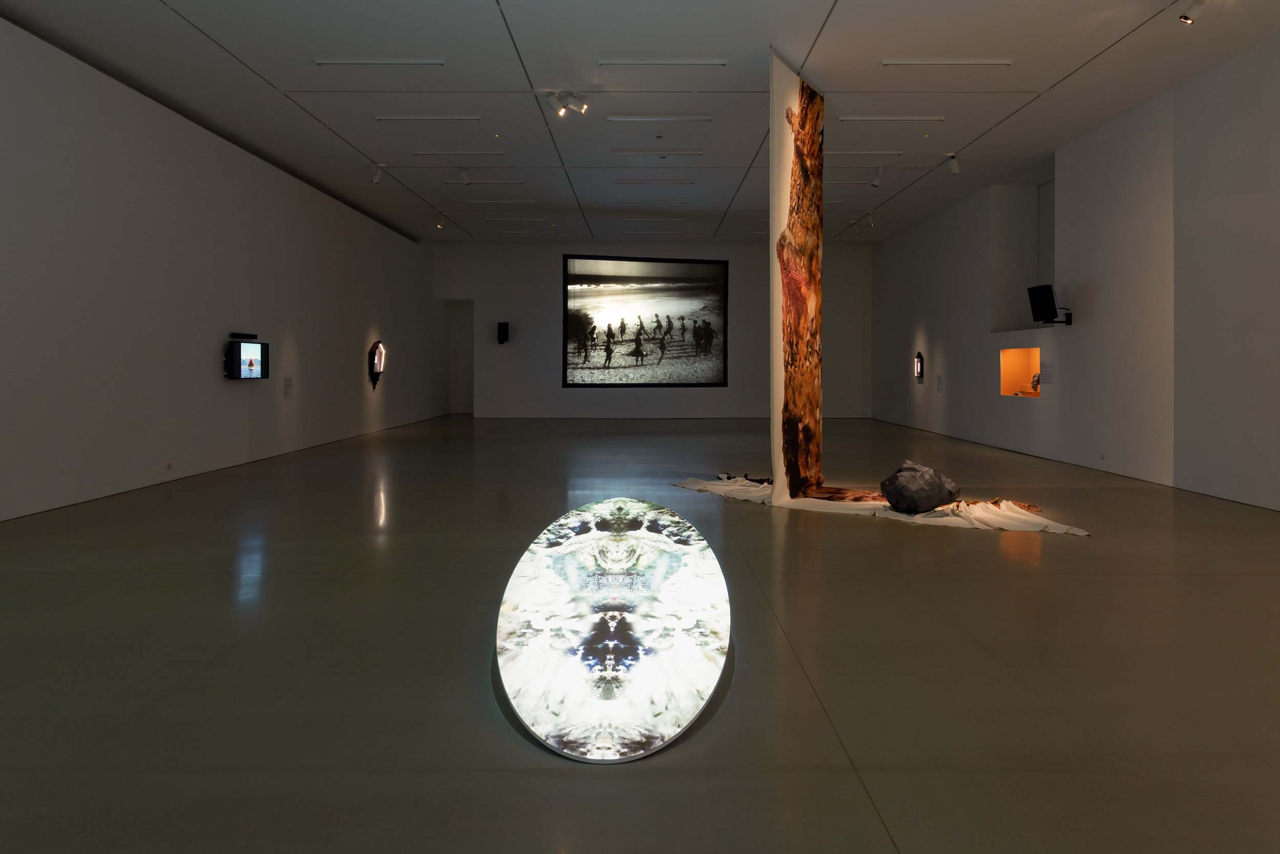 An exhibition of work in a white gallery space