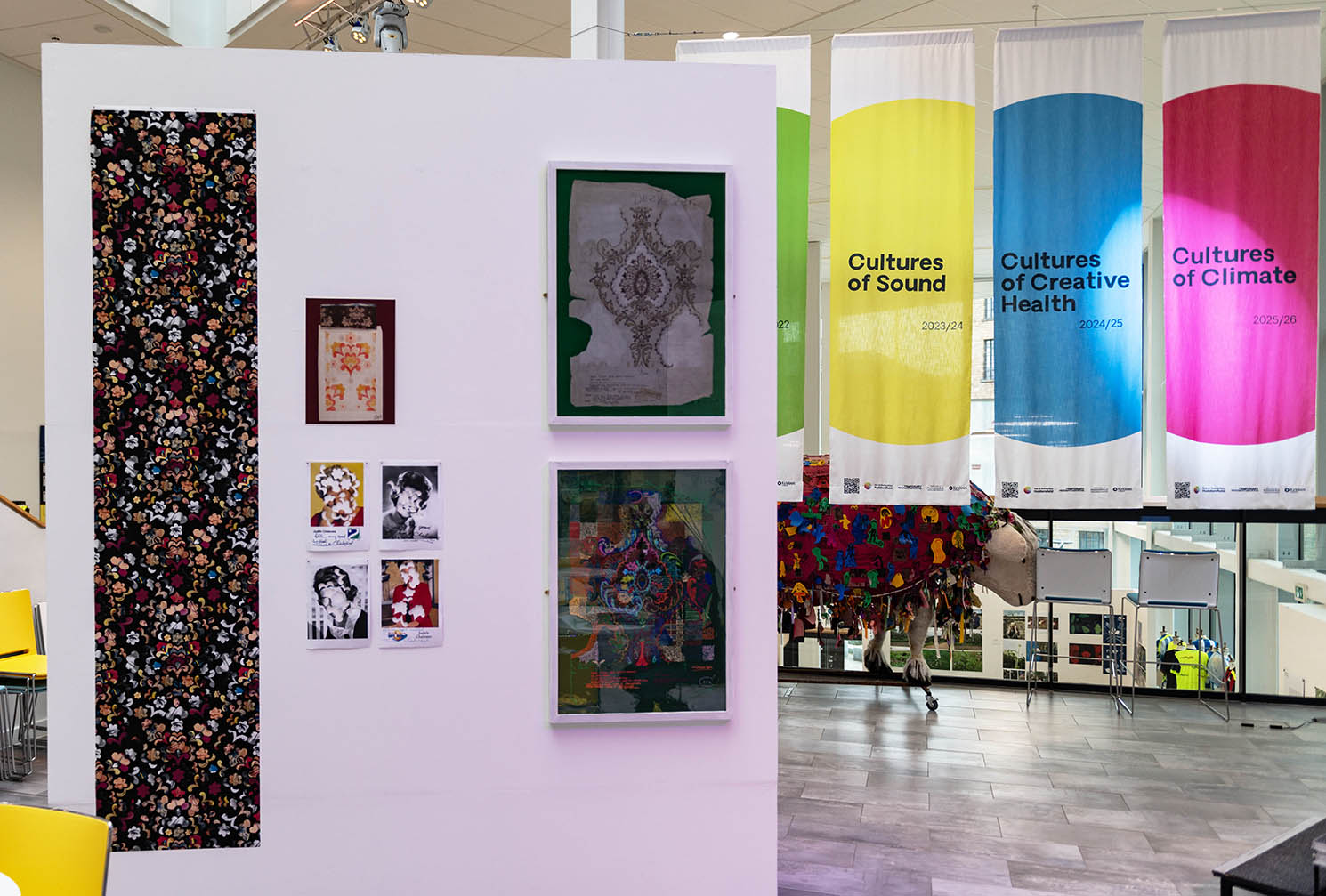 Material and artwork on white wall