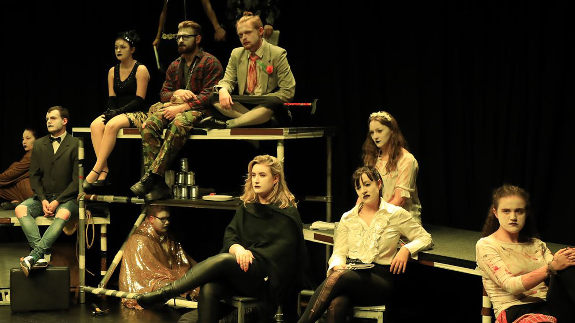 Drama students performing on stage