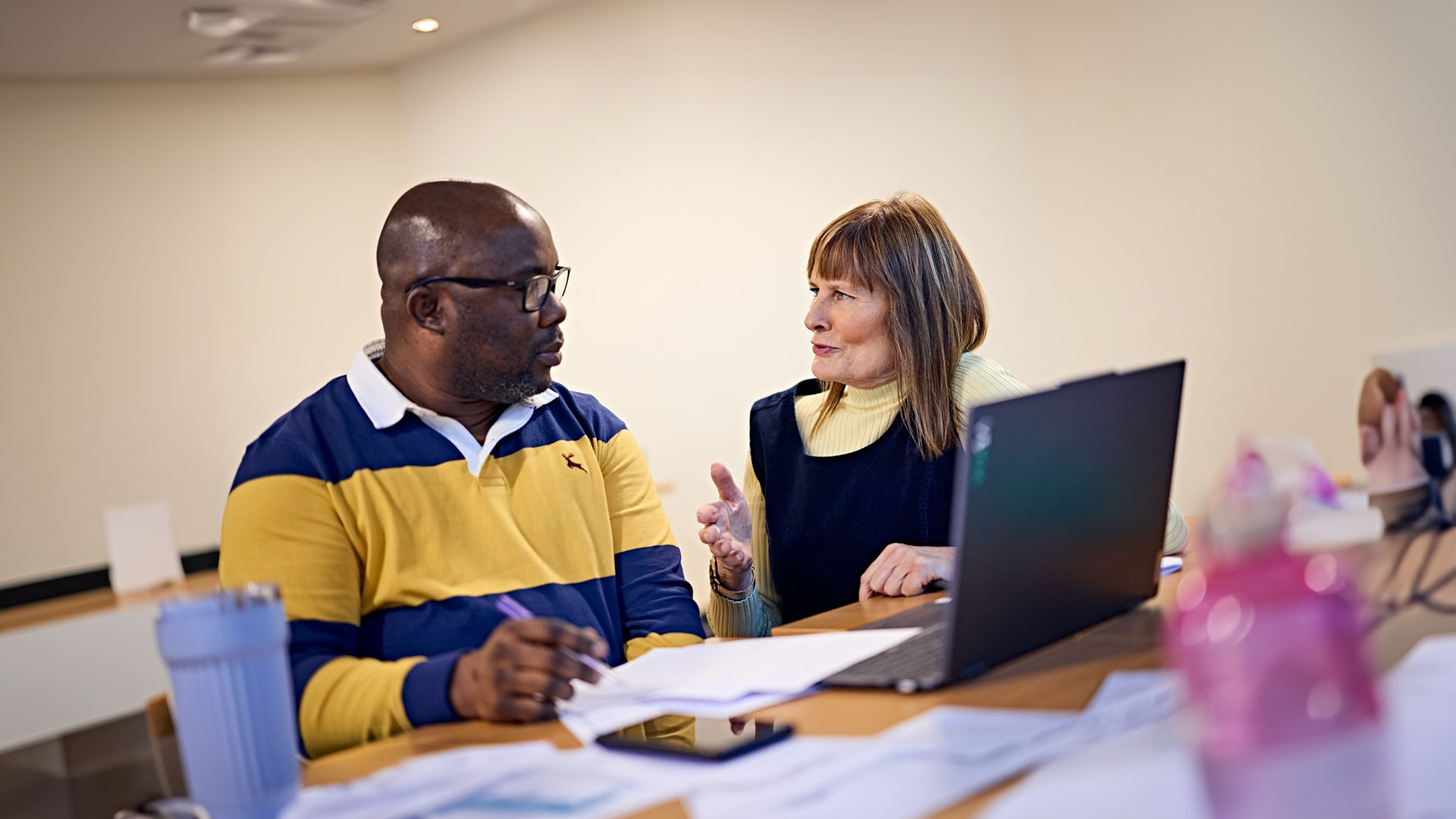 A students sitting with an academic