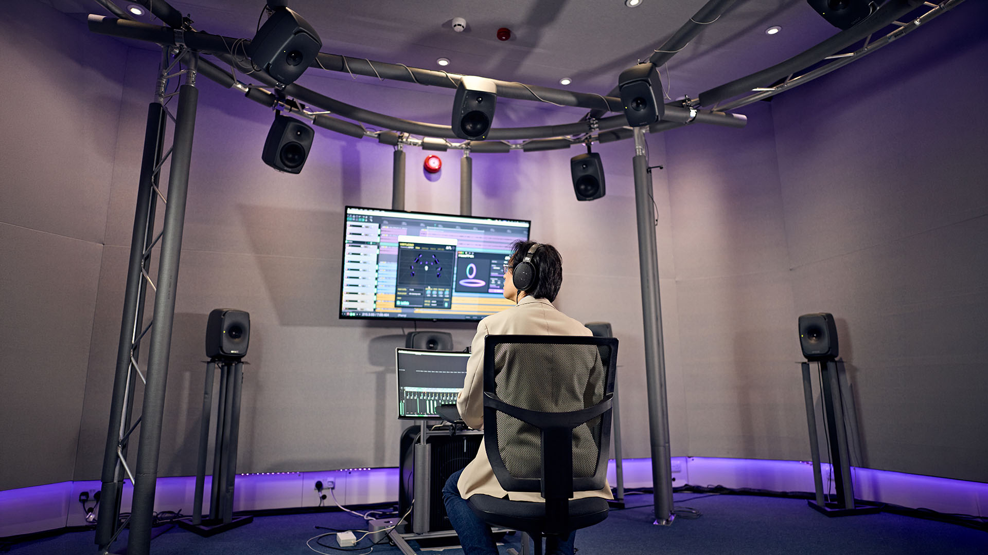 A researcher in the Immersive Audio and Spatial Psychoacoustics lab