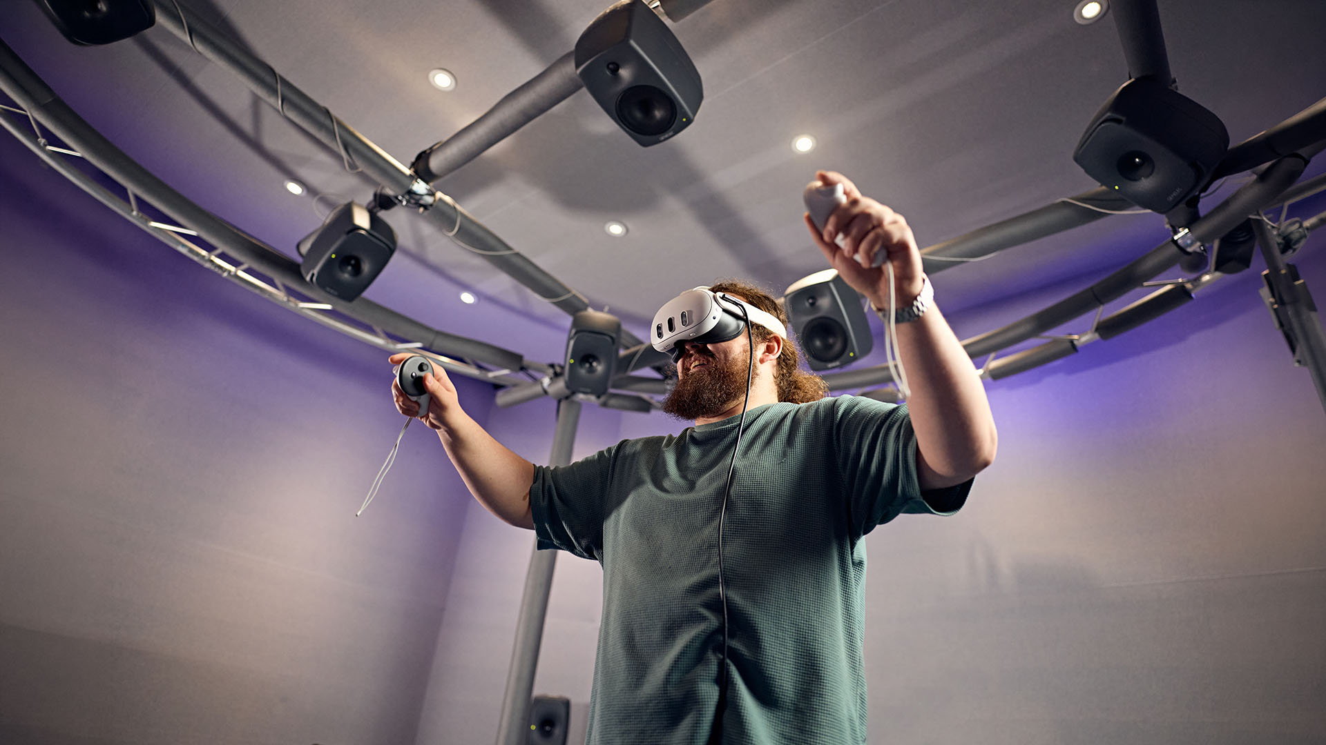 Researcher with a VR headset using the Immersive Audio and Spatial Psychoacoustics lab