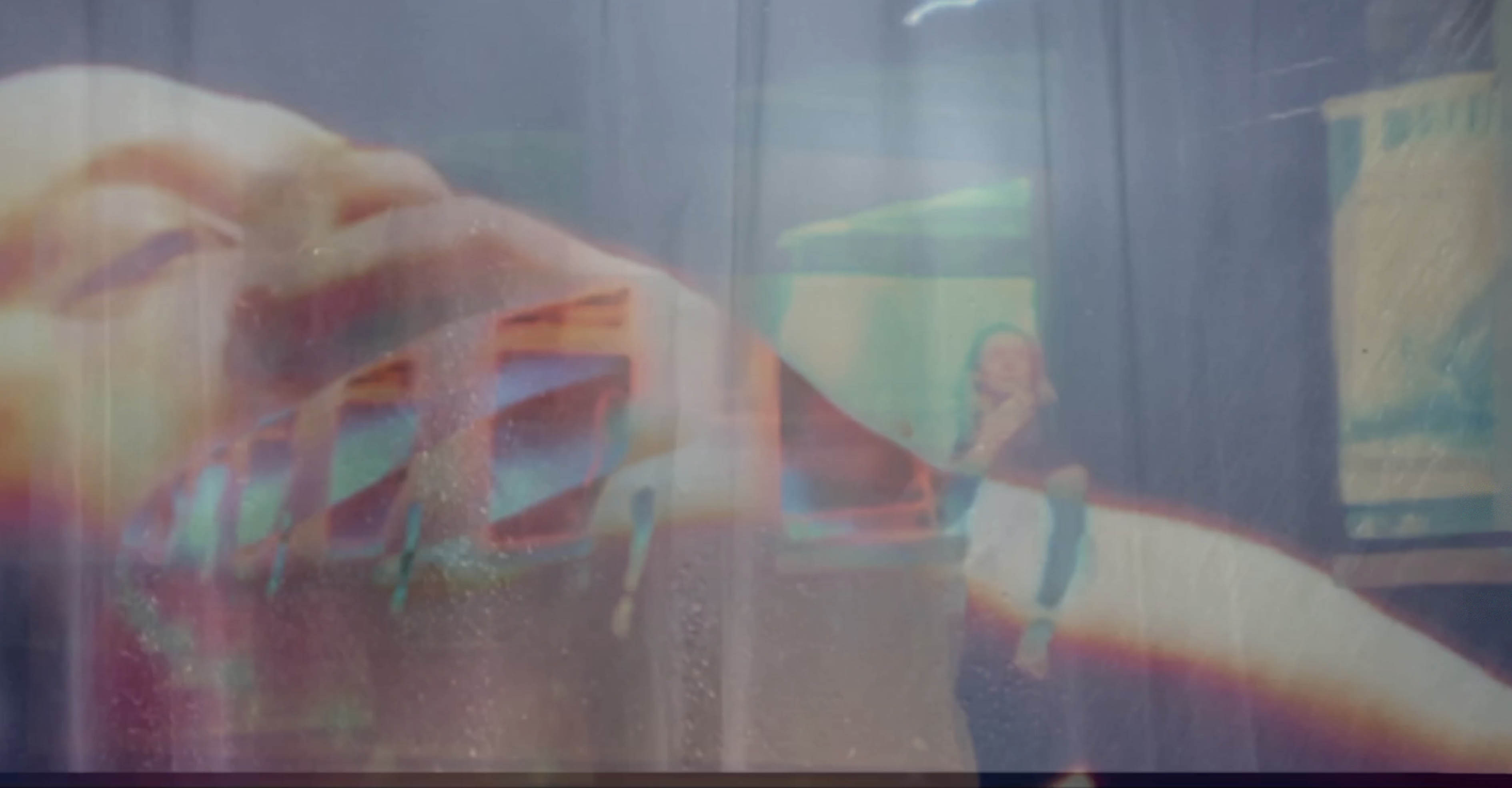 performer in front of a projected screen