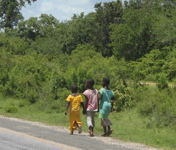 Young Tanzanian children walking
